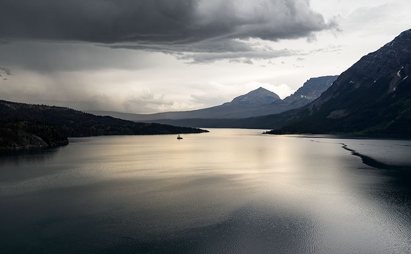 A summer storm brings rain to Lake St. Mary in Glacier National Park.
