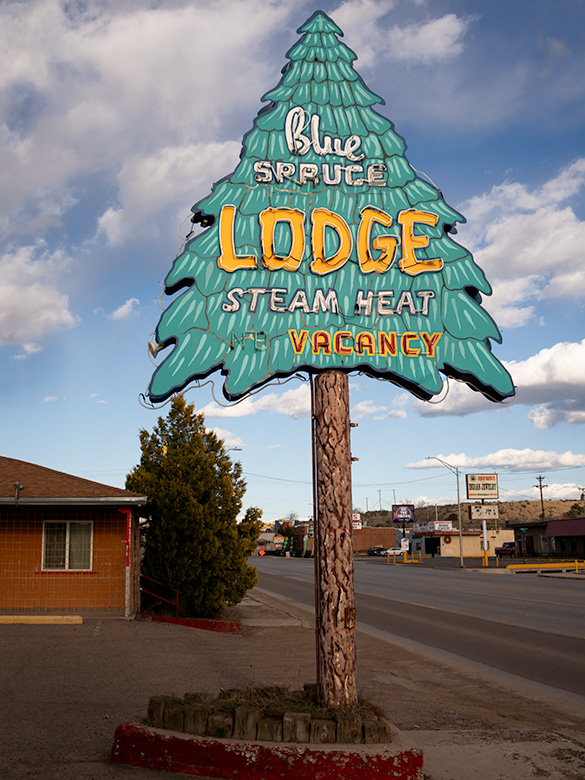 Blue Spruce Lodge sign showcasing classic Route 66 Americana