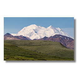Denali, the great mountain, very rarely stands naked to the world.