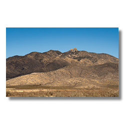 Dos Cabezas Mountains are a landmark along the Arizona - New Mexico border near Willcox.