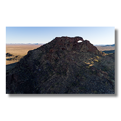 Eagle Eye Peak and its; natural bridge are a couple of miles south of Aguila Mountain
