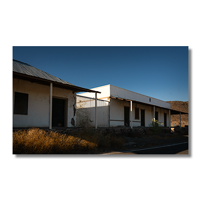 Plaster-covered adobe buildings in Agua Caliente, the former reception and guest quarters of a hot springs resort.