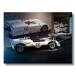 Chaparral cars showcasing airflow evolution in the Midland museum exhibit.