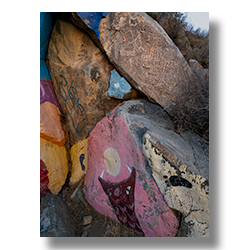 Close-up of Roy Purcell’s mural in the Cerbat Mountain foothills, painted adjacent to ancient petroglyphs, respecting historical rock art in Chloride, Arizona.