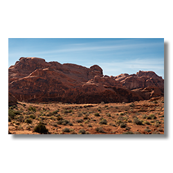 Red sandstone formations at Valley of Fire State Park, symbolizing the beauty of geologic processes over millennia.