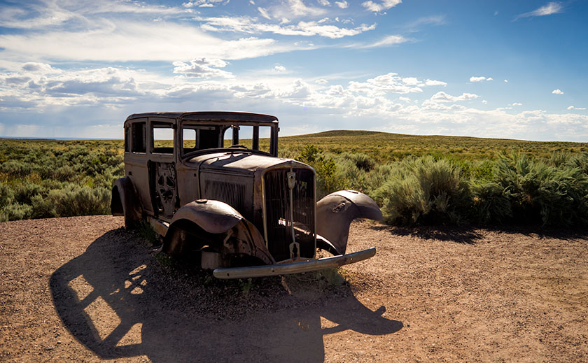 The shell of a 1932 Studebaker marks the spot that Route 66 intersected with the Petrified Forest Road.